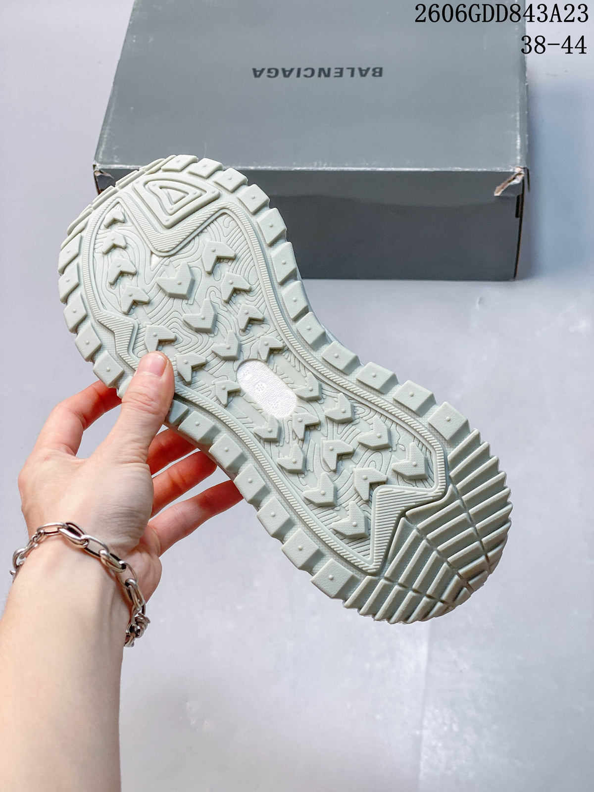 Close-up of the sneaker's chunky treaded outsole