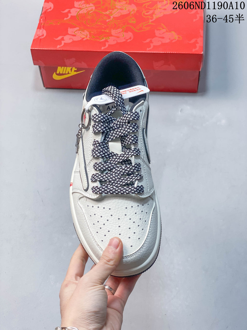 Top view showing the perforated toe and dark patterned laces
