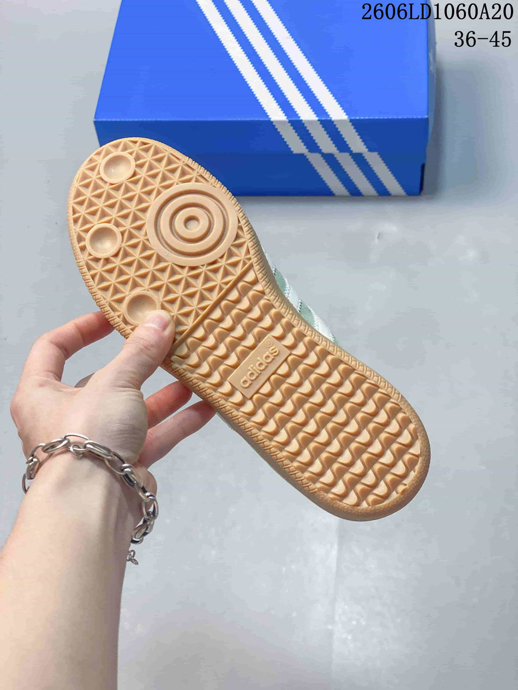 Close-up of the gum-colored outsole and its patterned tread.