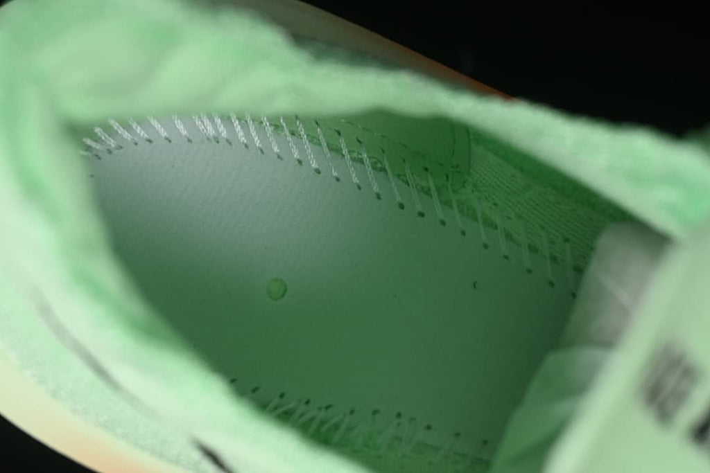 Close-up view inside the mint-green shoe