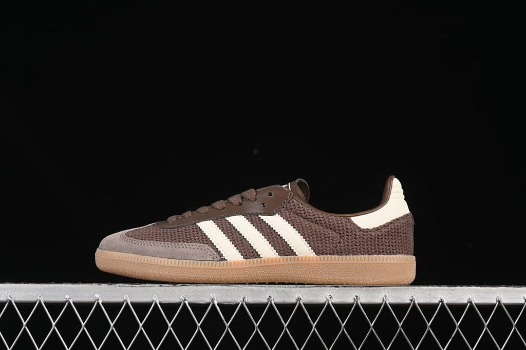 Side view of the brown adidas Samba OG sneaker with off-white stripes and gum-colored outsole