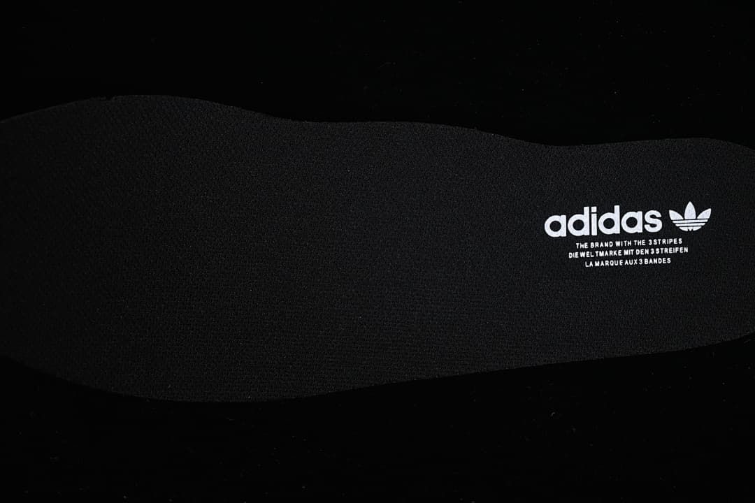 Close-up view of the insole with adidas branding