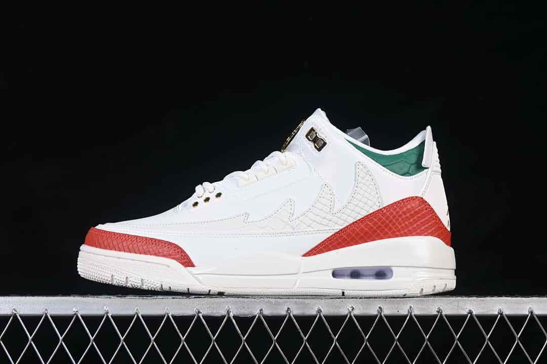 Opposite side view of white Jordan Air Jordan 3 sneakers with red and green accents