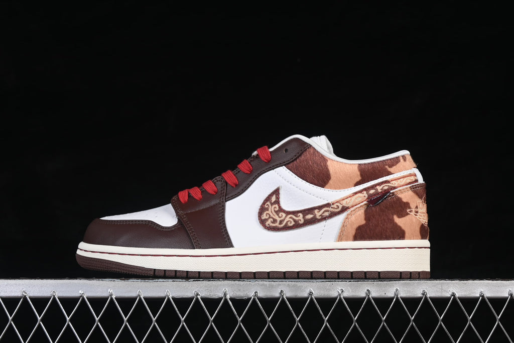 Side profile of the low-top sneaker with white, brown, and patterned panels.