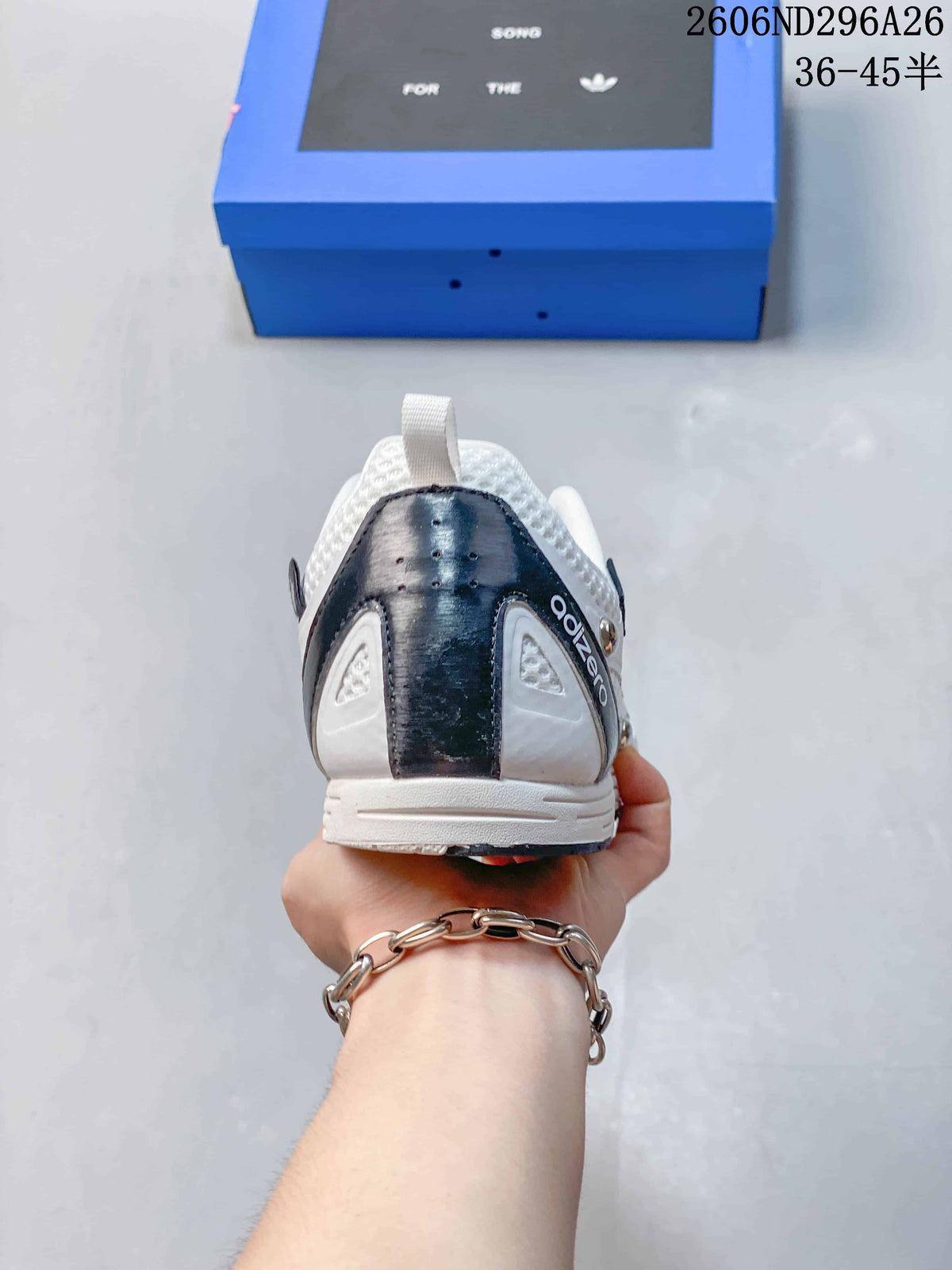 Rear view of a white sneaker with a dark heel panel
