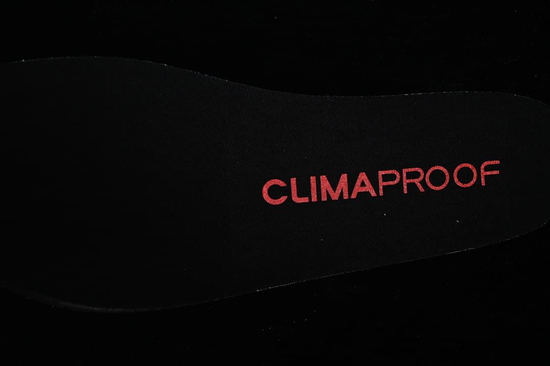 Close-up of a black insole marked Climaproof.
