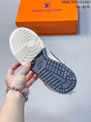 Underside view showing the white forefoot outsole and dark blue rubber traction pattern.