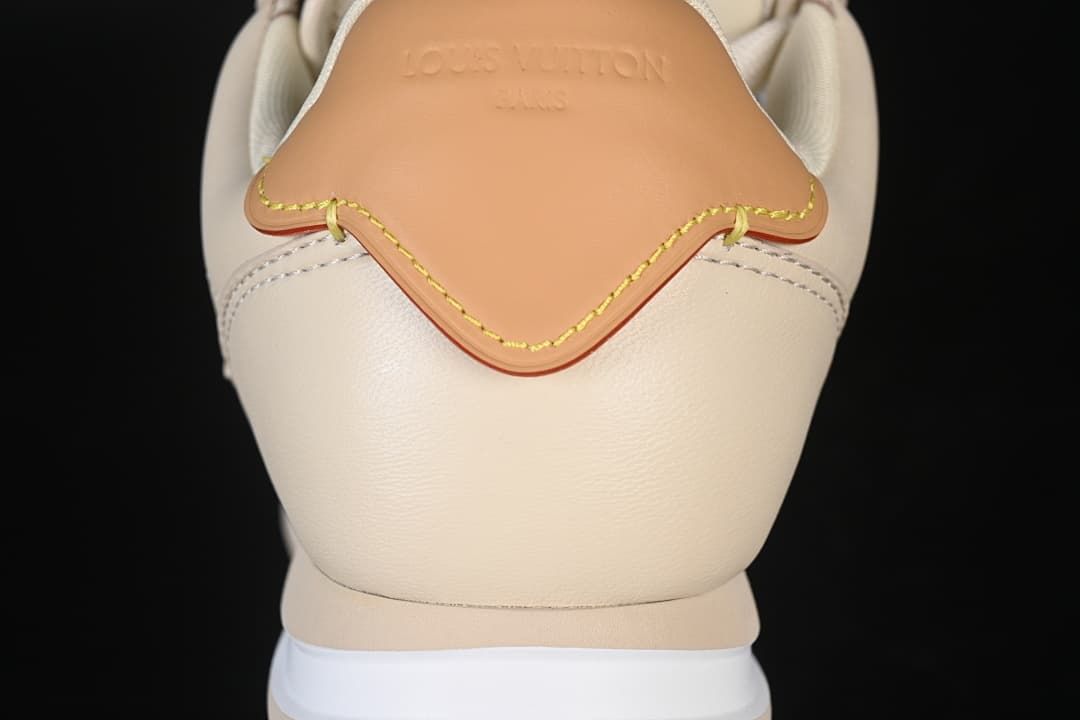 Rear view of sneaker with tan heel accent