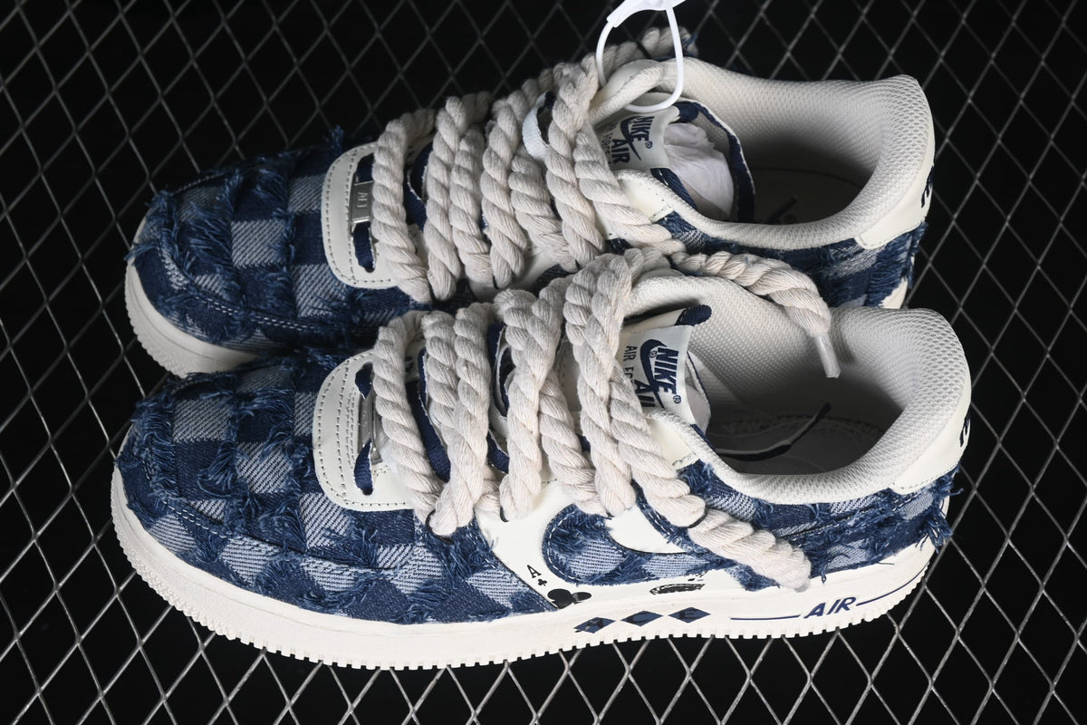 Overhead angled view of both sneakers and their rope laces