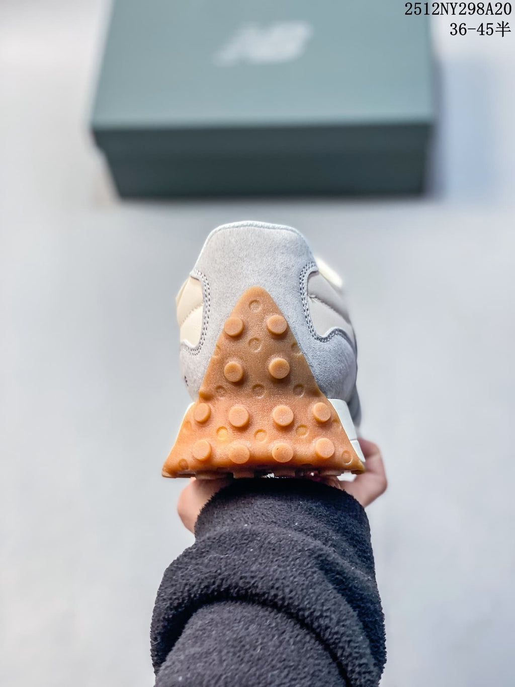 Rear view showing the heel and gum-colored outsole of the sneaker.