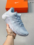 Close-up of a pale blue-gray Nike Free Metcon 7 training shoe with a white sculpted sole.