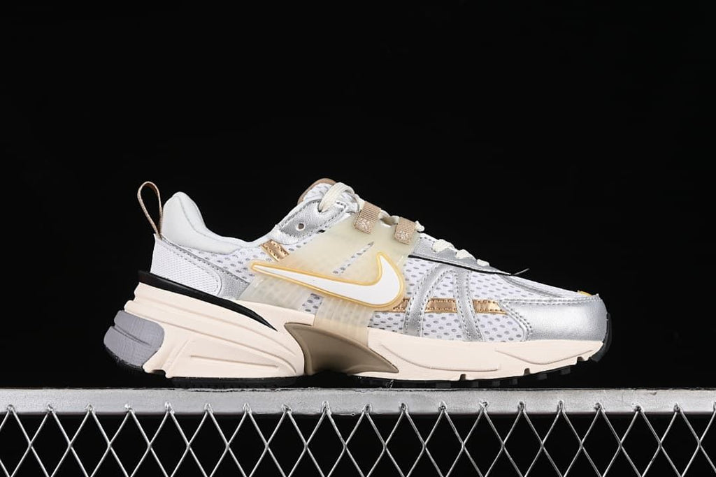 Side profile of the Nike V2K Run sneaker.