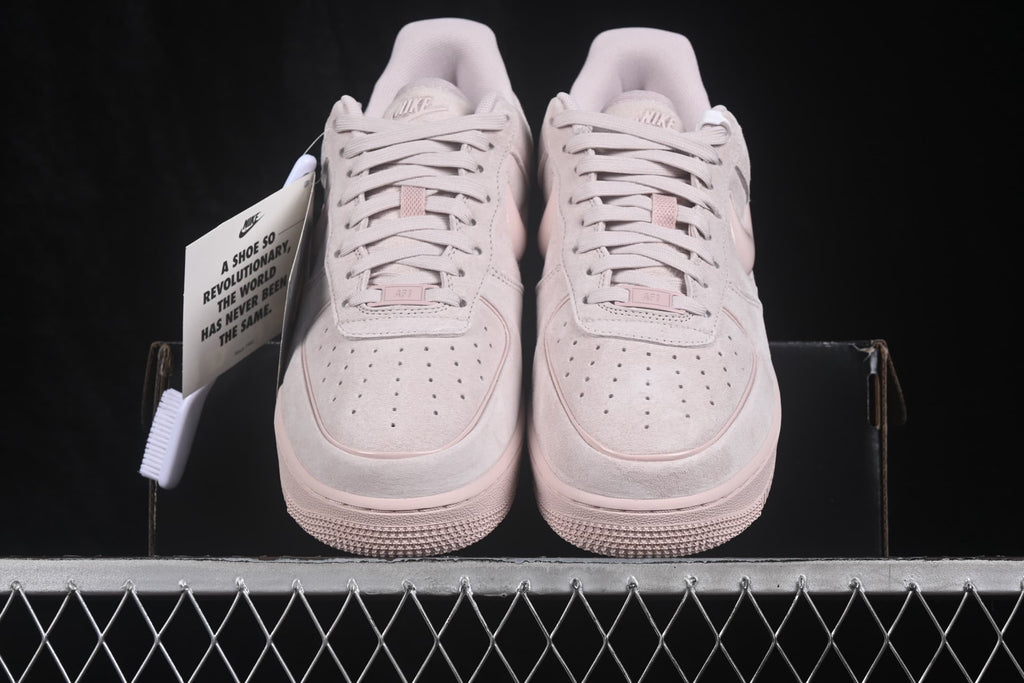 Front view of the pair displaying the perforated toe boxes, laces and tongue branding.