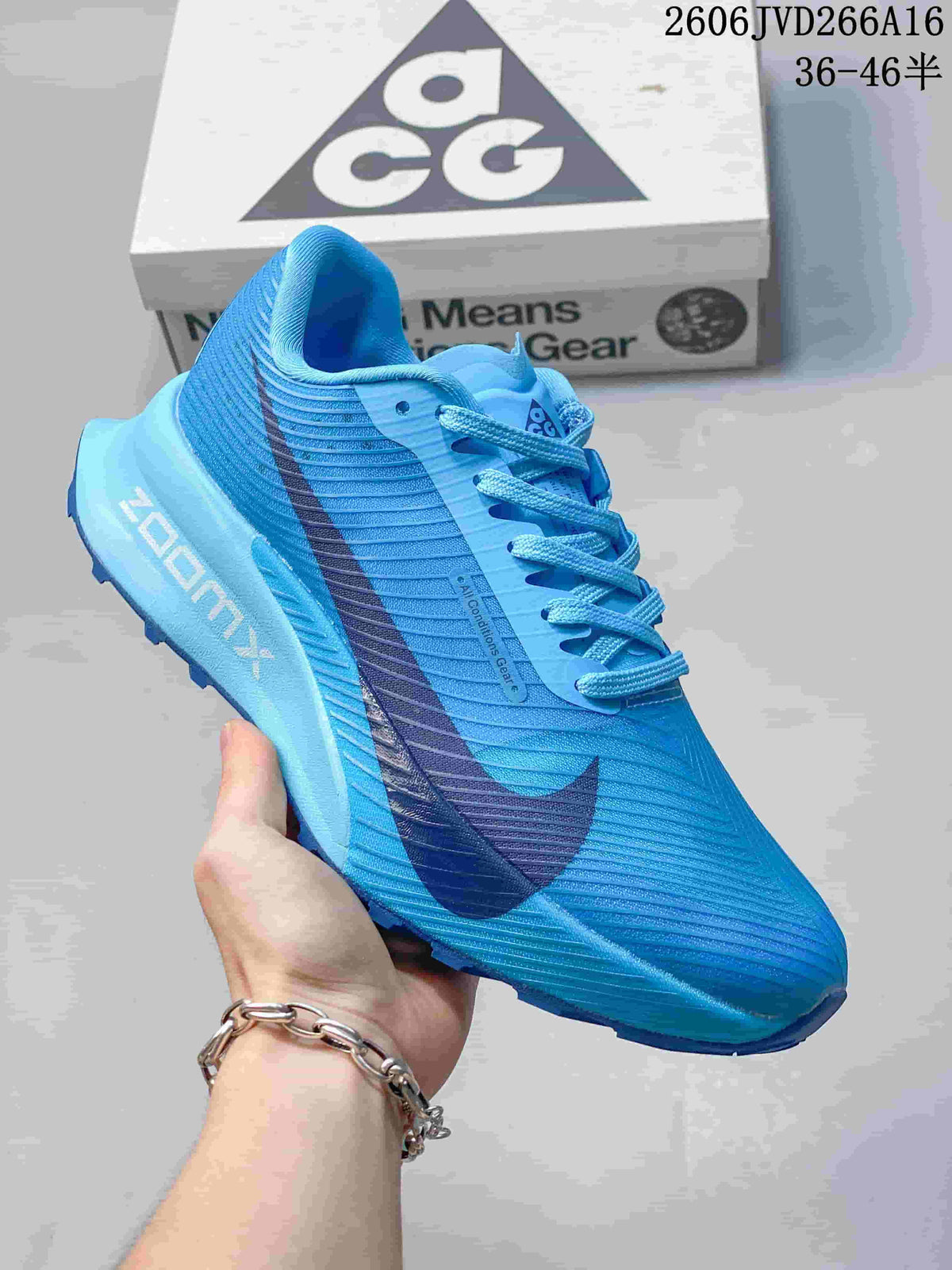 Side view showing the blue upper and dark Swoosh