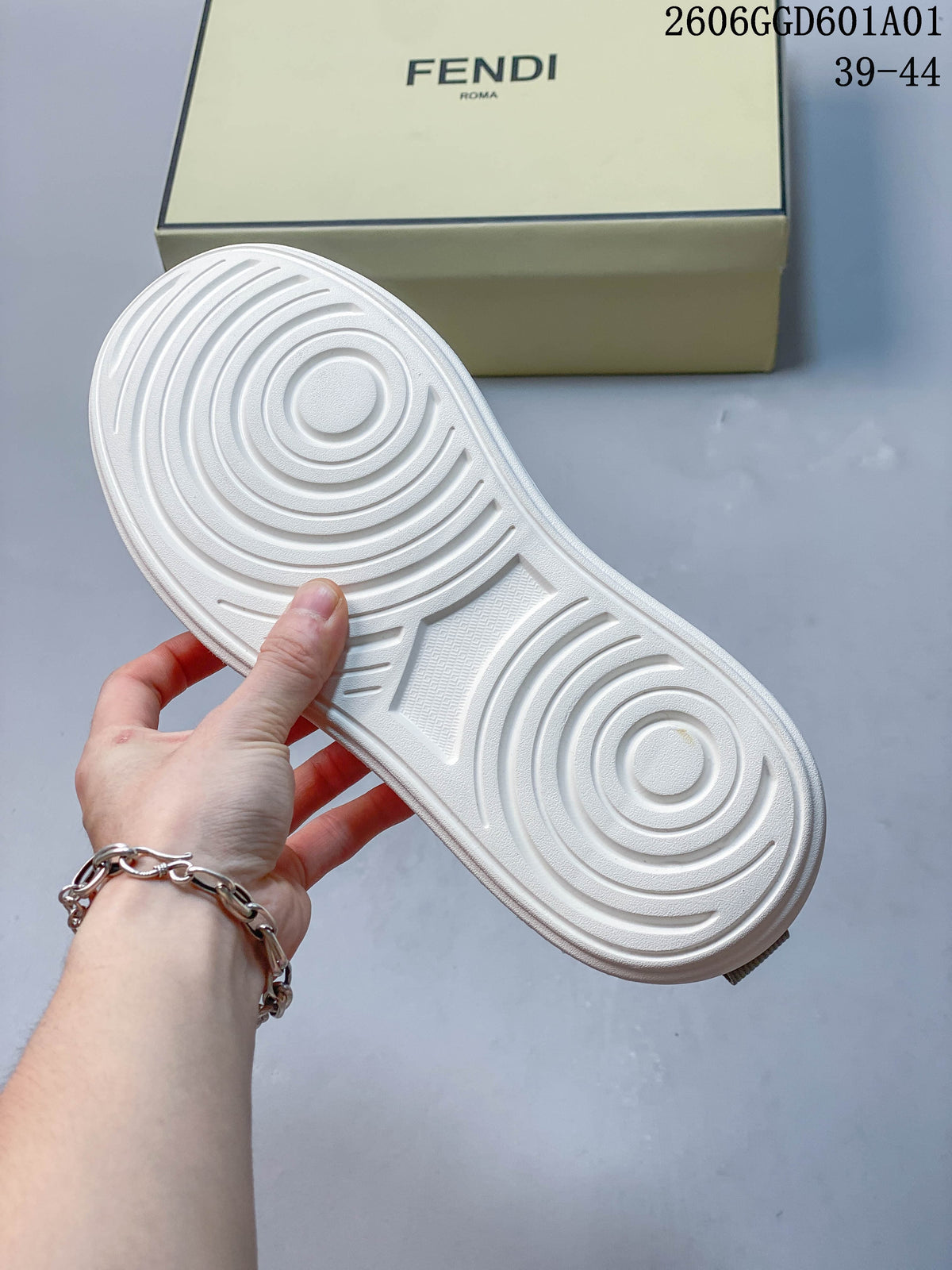 Close-up of the white patterned outsole and shoe box