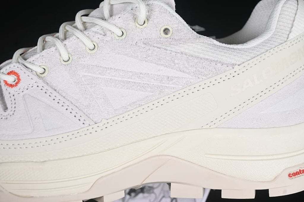 Close-up of the side panels, lace eyelets, and midsole