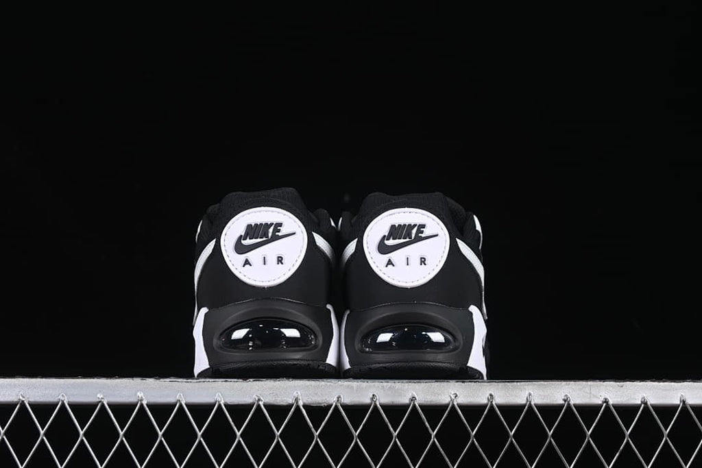 Rear view of both shoes showing heel branding and Air units