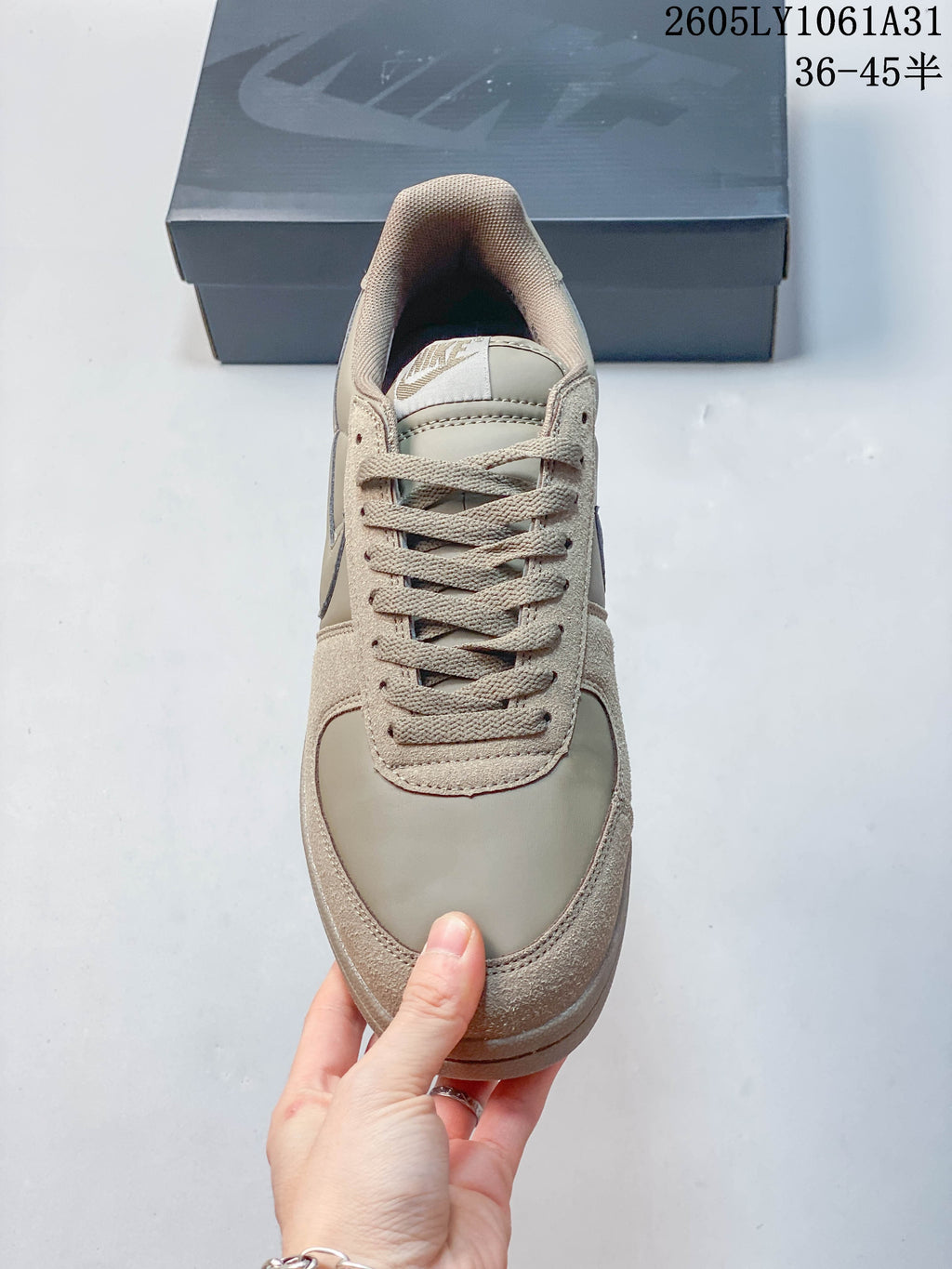 Top view of the sneaker showing the laces and toe panel