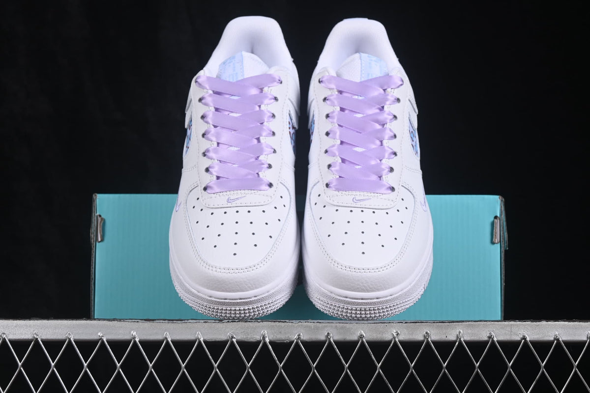 Front view of the pair with lavender laces and perforated toe boxes.