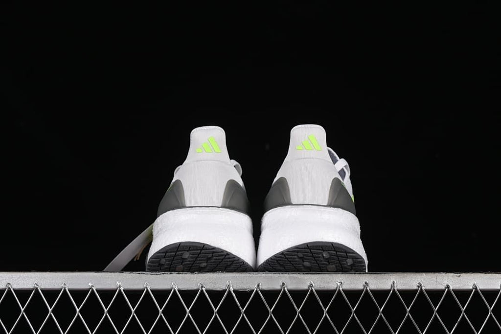 Rear view of the pair showing heel details and outsoles.