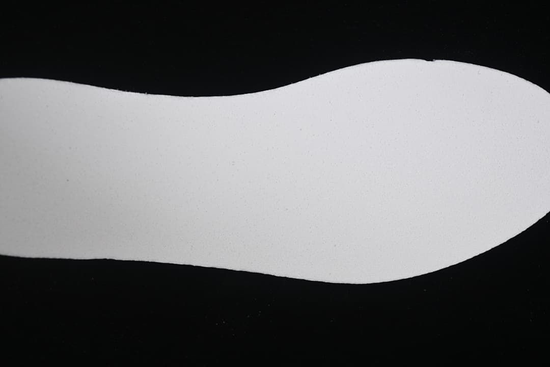 Close view of a plain white shoe insert