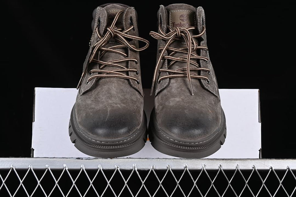 Front view of the pair showing rounded toes and lace-up fronts