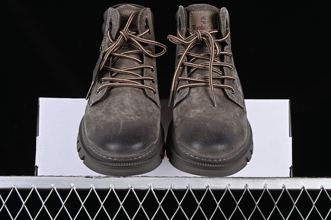 Front view of the pair showing rounded toes and lace-up fronts