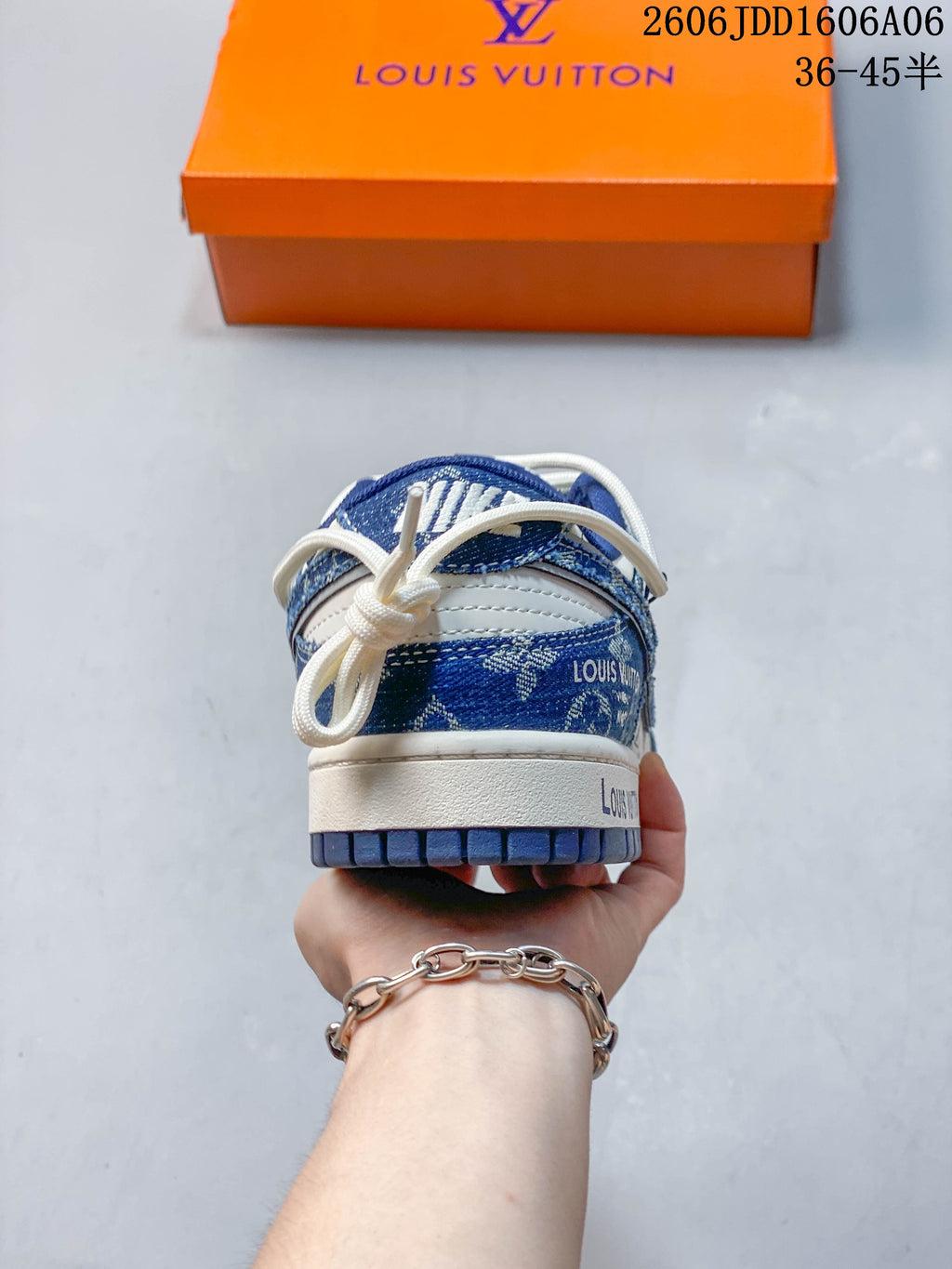Rear view of the sneaker showing patterned heel panels and white laces