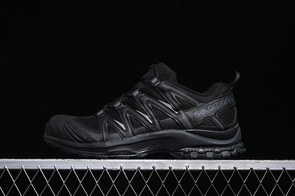 Side view of a black Salomon XA Pro 3D trail running shoe