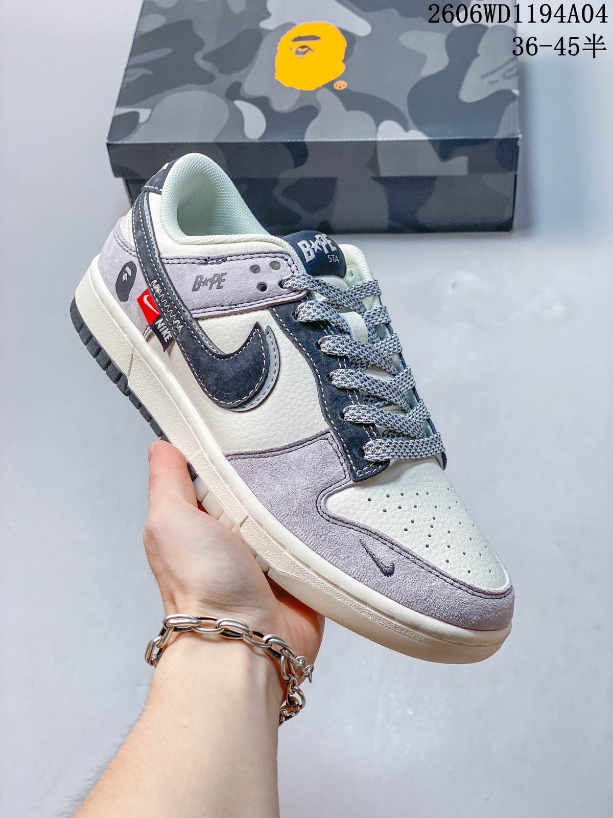 Angled side view showing the shoe’s color blocking, branding details and low-top profile