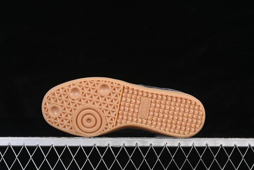 Underside view showing the textured gum-colored outsole