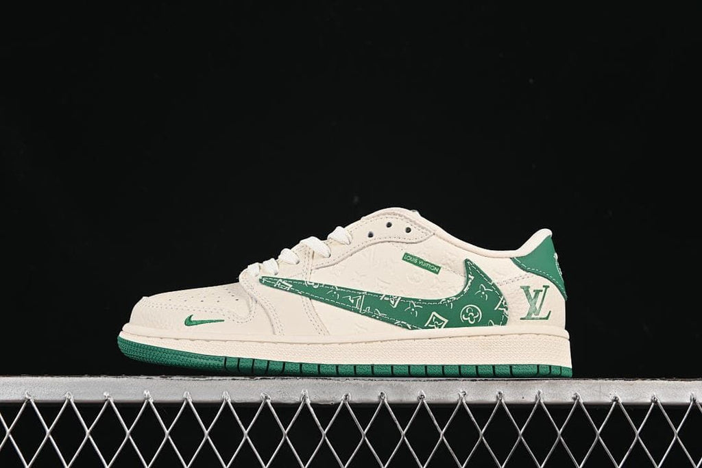 Side view of a cream and green low-top sneaker with a patterned green side panel