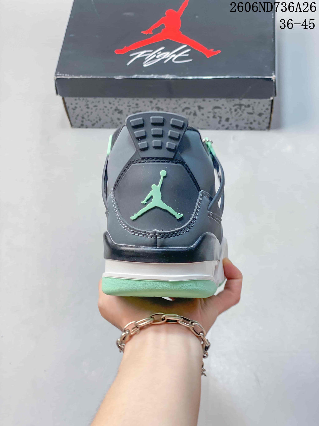 Rear view of the sneaker showing the heel emblem and mint outsole accent