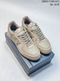 Pair of taupe Nike Field General 82 SP sneakers shown from above and at an angle