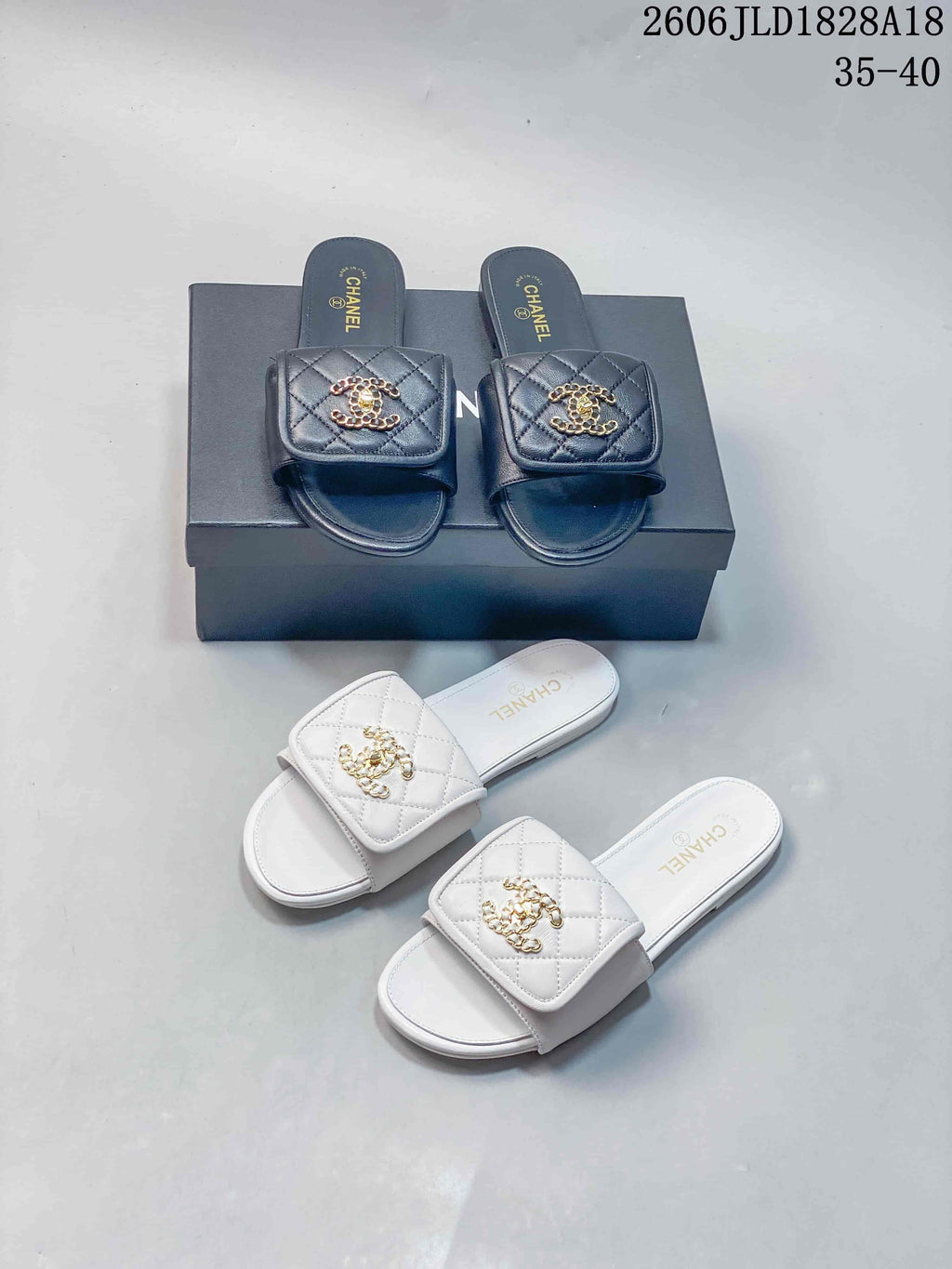 Black and white quilted slide sandals displayed together.