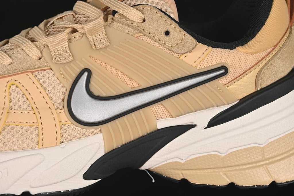 Close-up of the silver Swoosh and layered side panels