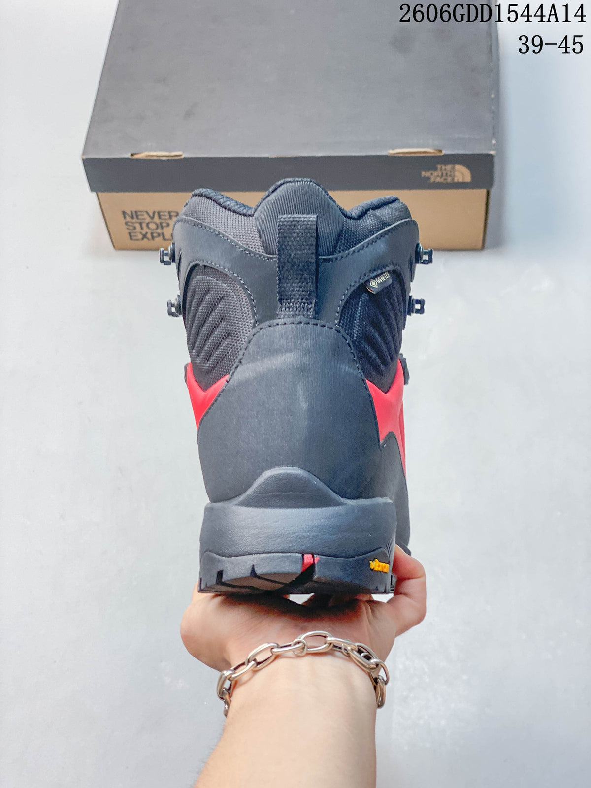 Rear view of the gray and red hiking boot showing its padded collar and heel