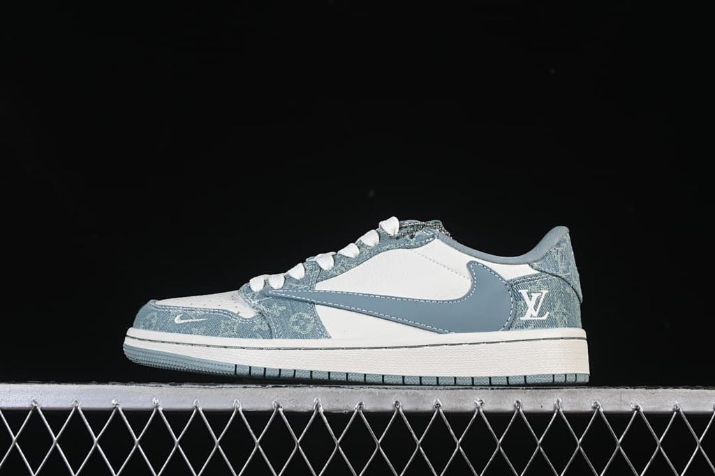 Side view of a white and blue Jordan 1 Low with denim-style patterned panels and a blue Swoosh