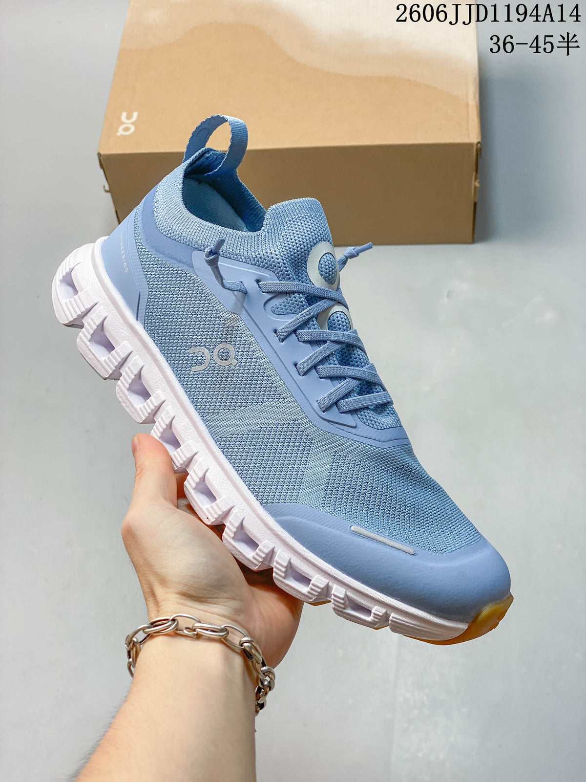 Angled side view of a blue sneaker with a white segmented outsole.