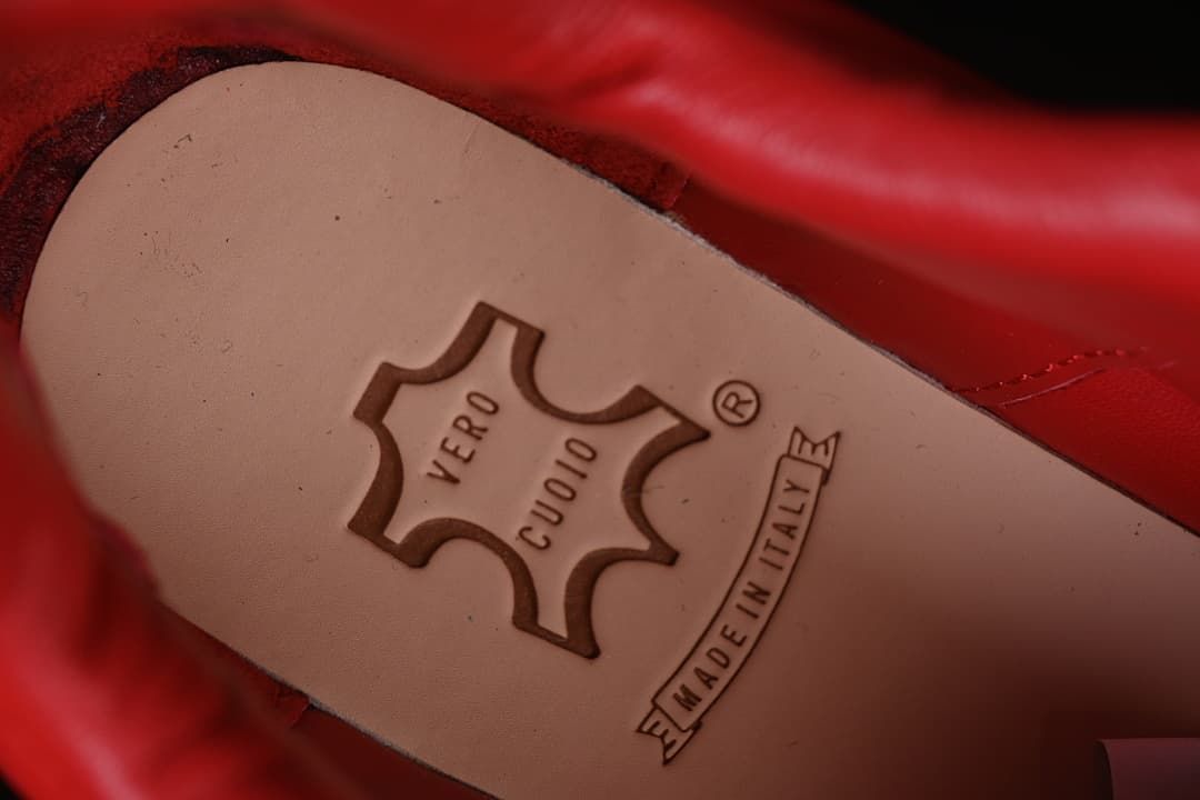 Close-up of an insole stamp reading VERO CUOIO and MADE IN ITALY