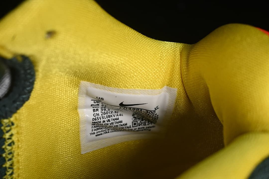 Close-up of the shoe's size label on the yellow lining