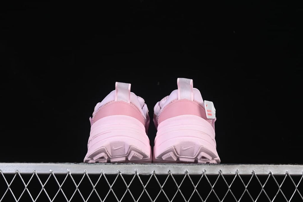 Rear view of the pair showing heel panels, pull tabs and outsole shape.