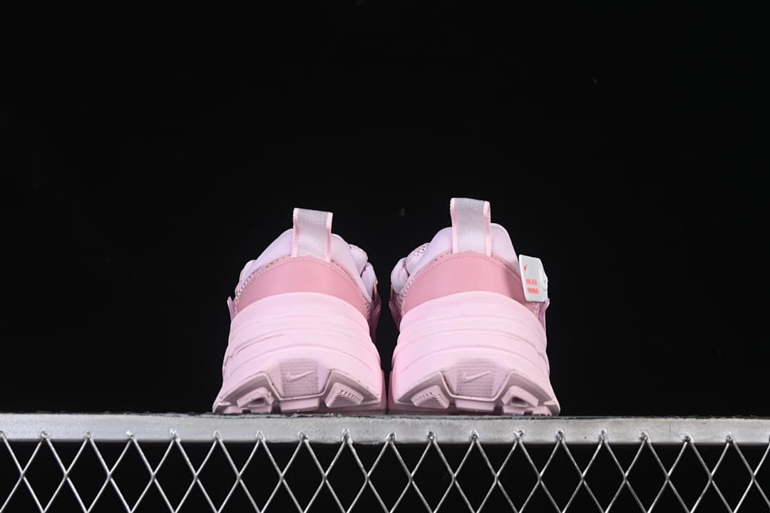 Rear view of the pair showing heel panels, pull tabs and outsole shape.