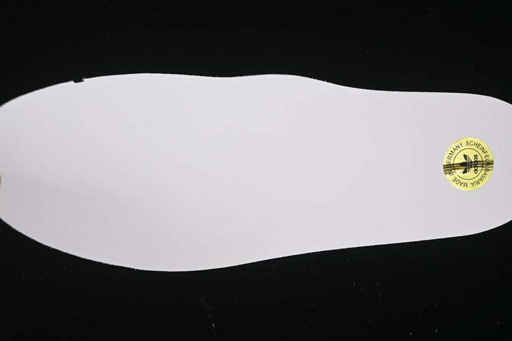 White sneaker outsole shown from below