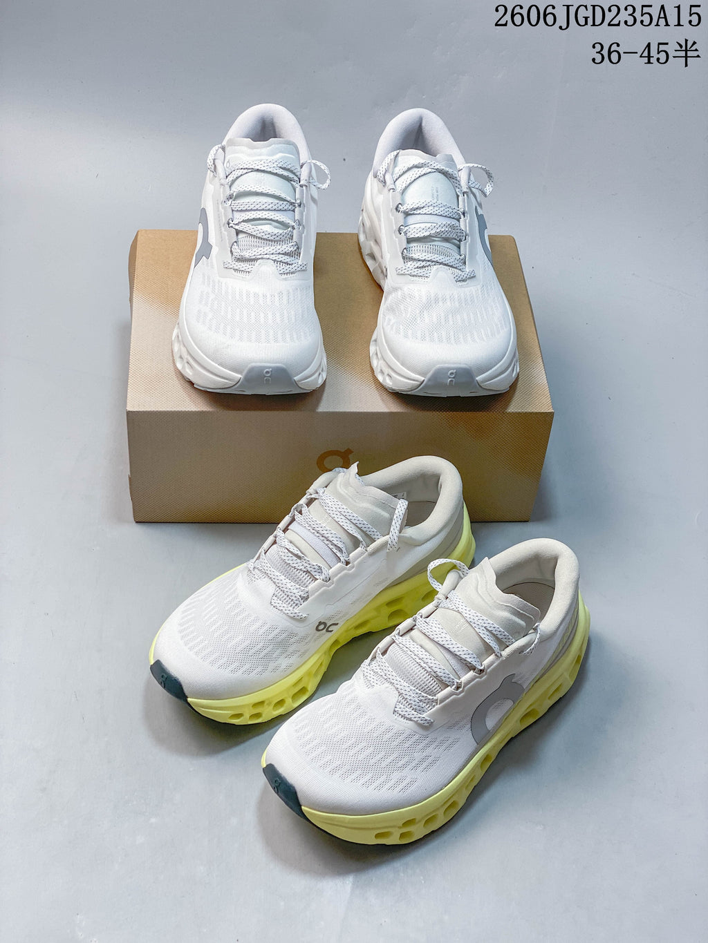 White On running shoes shown in gray-accent and yellow-accent versions