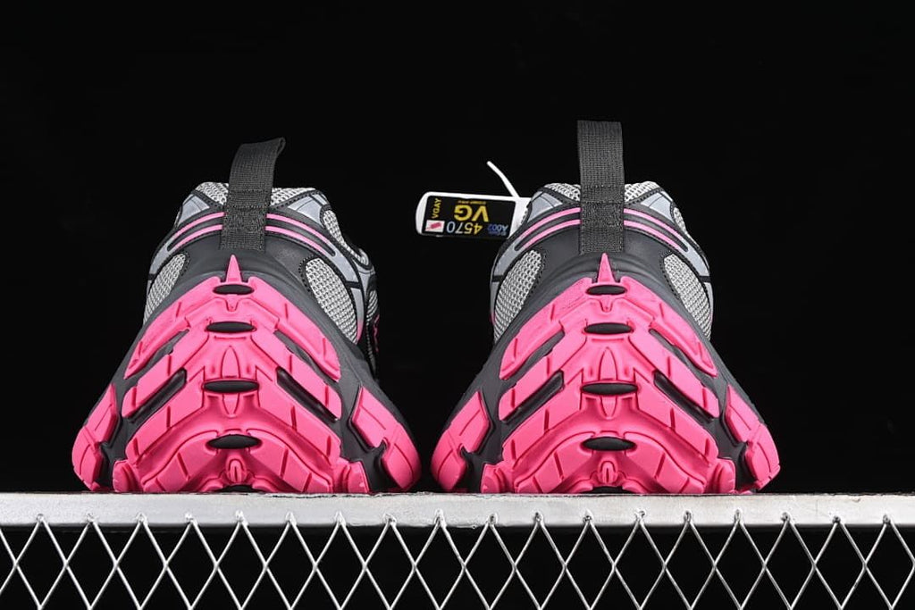 Rear view of the pair highlighting the bright pink outsole