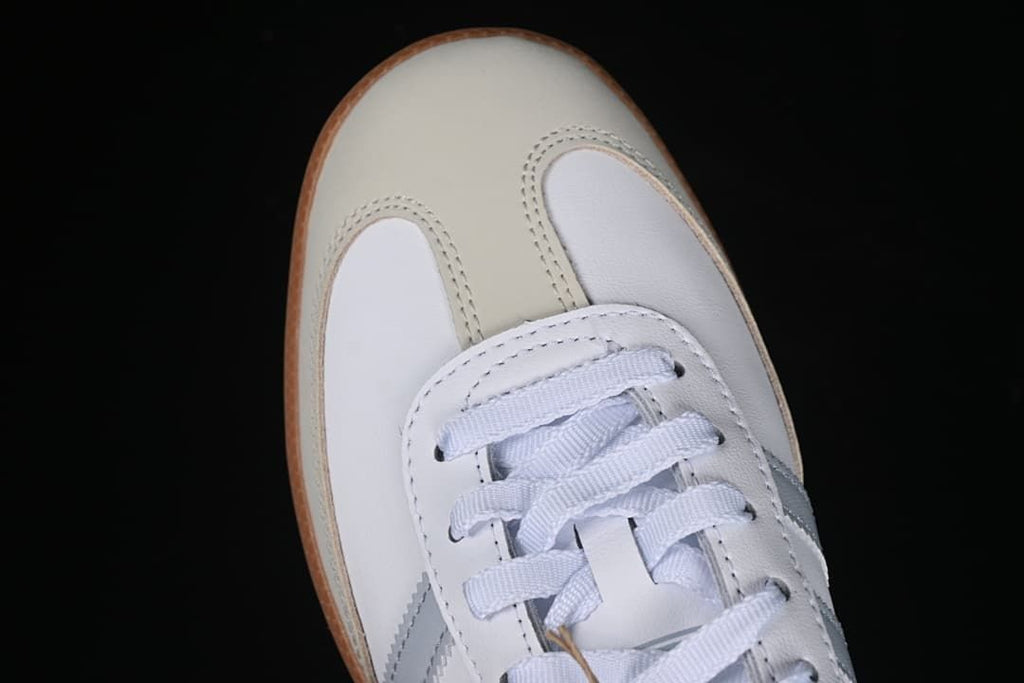 Top view of the sneaker toe and white laces
