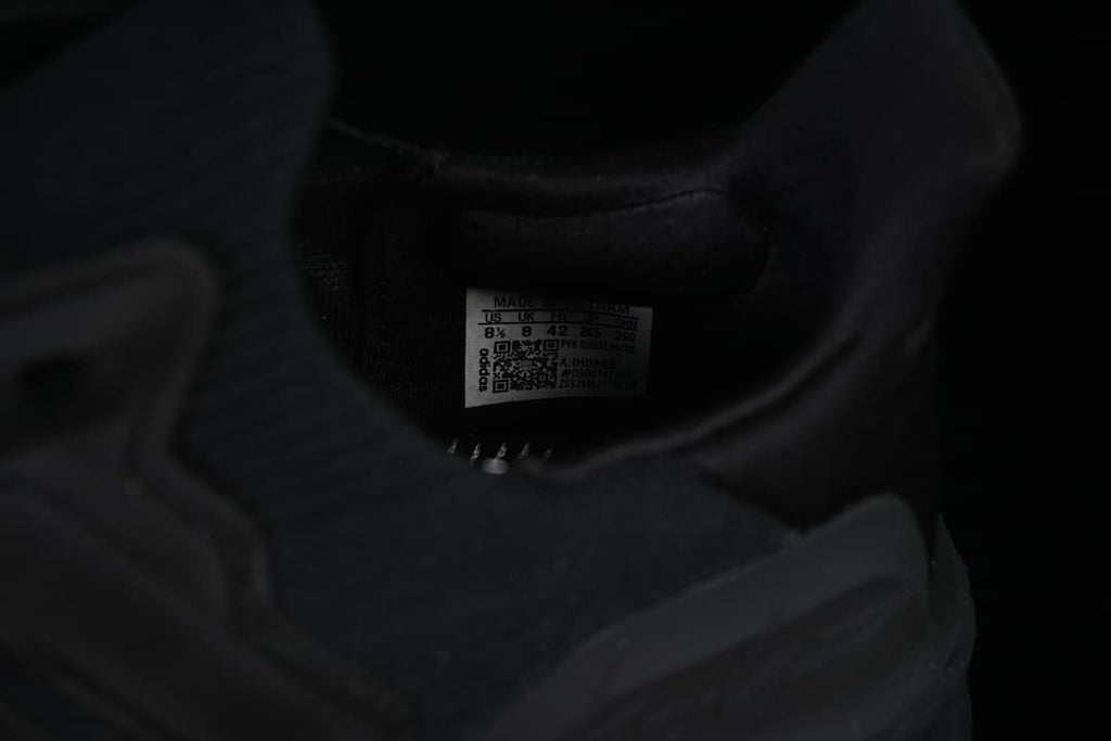 Interior size label photographed inside the shoe.