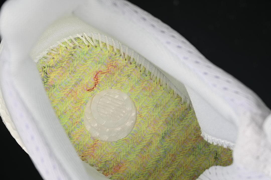 View into the shoe showing the patterned footbed.
