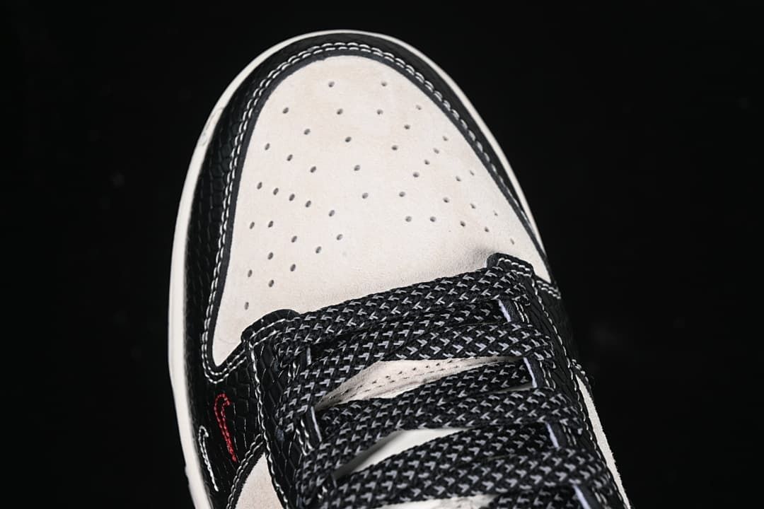 Top view of the perforated toe and patterned laces